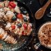 Delicious oatmeal breakfast bowl with fresh fruits and a cup of coffee.